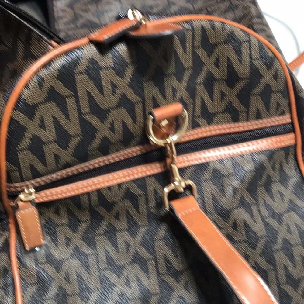 NX signature logo weekender, fully lined with inside zipper pocket. - Picture 9 of 9